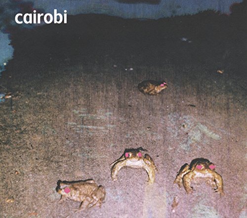 Vinyl record cover with a dark, grainy image of three frogs.