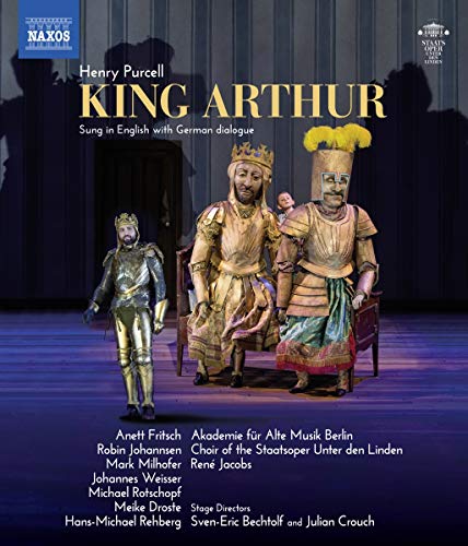 "Blu-ray cover featuring three men in medieval costumes on a stage."
