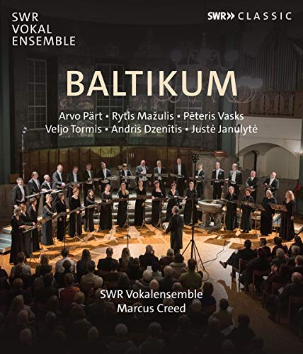The image depicts a choir performing on stage with an audience. The choir is dressed in formal attire, standing on a raised platform, with a conductor leading them. The background features a large church or concert hall setting, with a crowd of people seated in the audience. The title "Baltikum" is prominently displayed in large text at the top, accompanied by smaller text listing the names of composers. The overall atmosphere suggests a classical music performance. A suitable alt text could