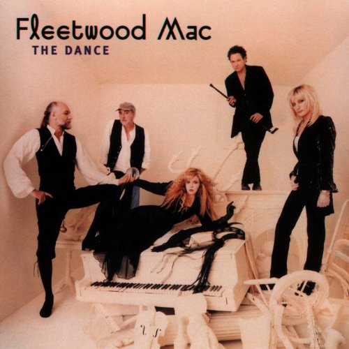 "CD cover featuring Fleetwood Mac band members posing around a white piano."