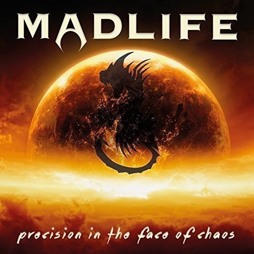 "Album cover with dragon silhouette on a planet, orange sky, and 'Madlife' title."
