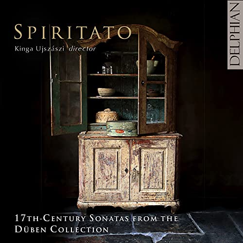 CD cover featuring an antique wooden cabinet with open doors.