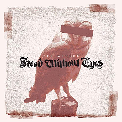 "Album cover featuring a red-toned owl with a black bar over its eyes."