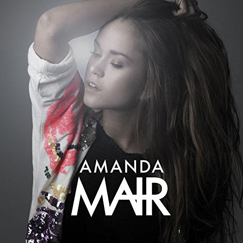 Amanda Mair CD cover featuring a woman with long brown hair against a dark background.