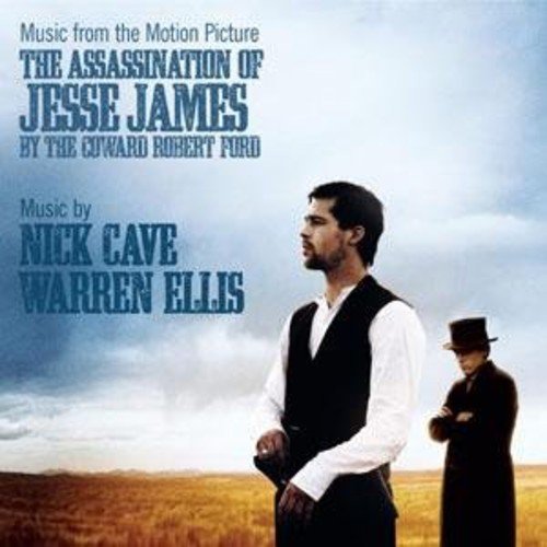 "Album cover with two men standing in a field, cloudy sky in the background."