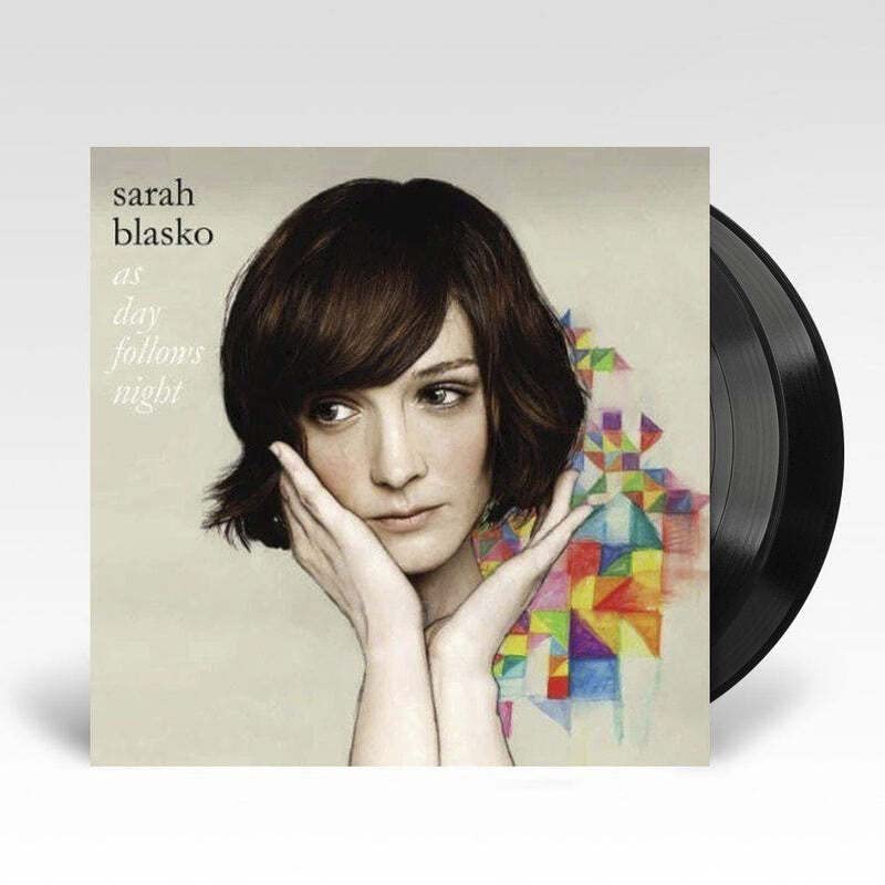 Album cover featuring Sarah Blasko with hands on cheeks beside a black vinyl record.