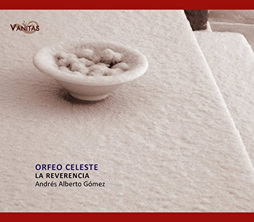 A CD cover with a bowl of salt on a salt-covered surface, red borders.