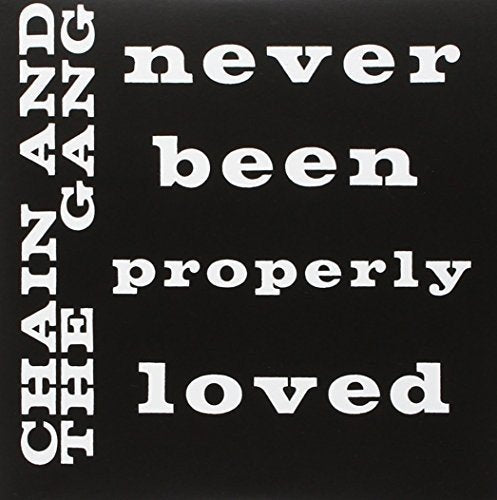 Black album cover with white text: “Chain And The Gang - Never Been Properly Loved.”