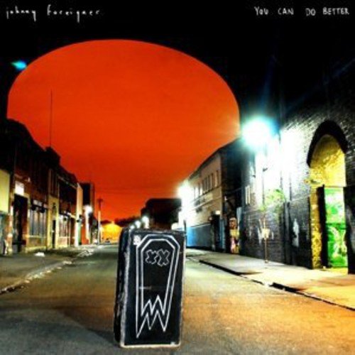 Album cover with a coffin on a dark street under a red sky.