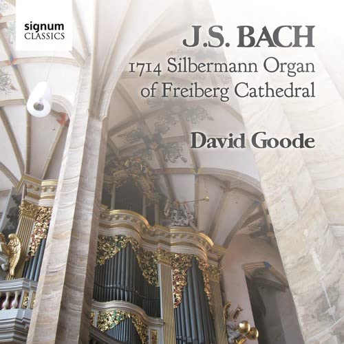CD cover featuring a gilded organ inside a stone cathedral.