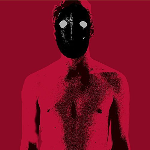 The image depicts a black silhouette of a man against a red background. For accessibility purposes, a suitable alt text could be: "Black silhouette of a man with glowing white eyes on red background."