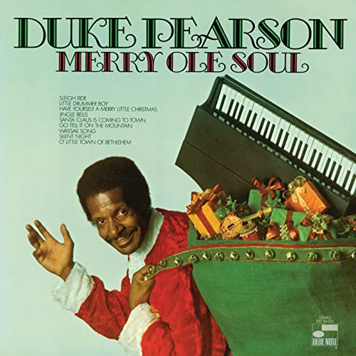 Duke Pearson's "Merry Ole Soul" vinyl album cover with a portrait and gifts.