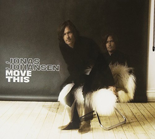 CD cover for Jonas Johansen’s “Move This” featuring two men and fur.
