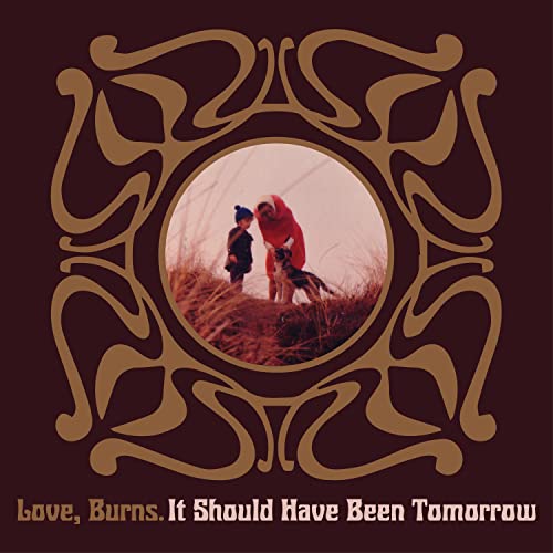 CD cover: two figures and a dog within an ornate, circular frame.