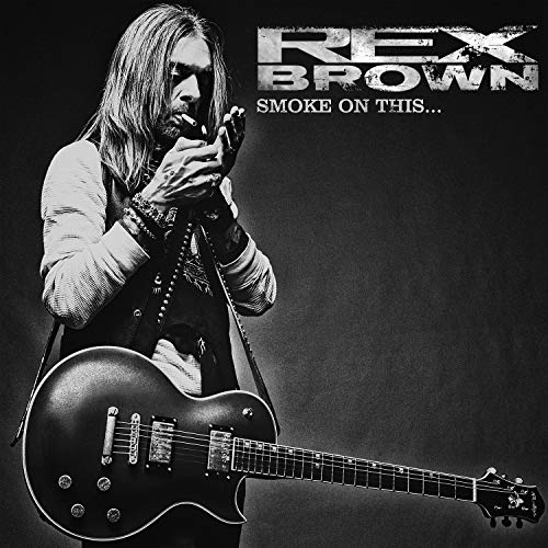 Black and white album cover featuring Rex Brown with a guitar.