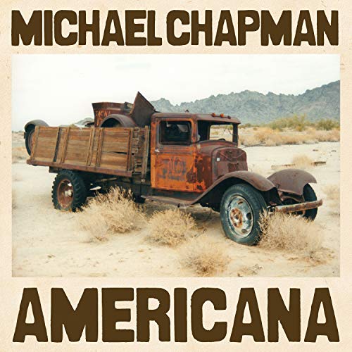 Album cover with old truck in desert, artist and title in brown text.