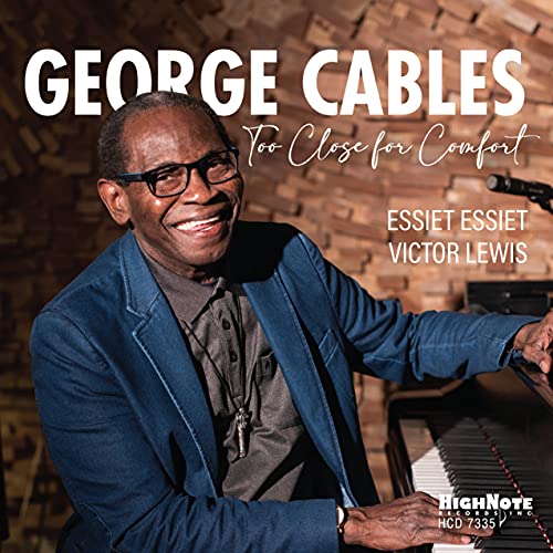 CD cover featuring jazz pianist George Cables smiling with bandmates.