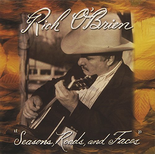 CD cover featuring a man with a cowboy hat playing guitar.