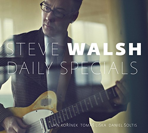 Album cover with man playing guitar, titled "Steve Walsh Daily Specials" in white text overlay.