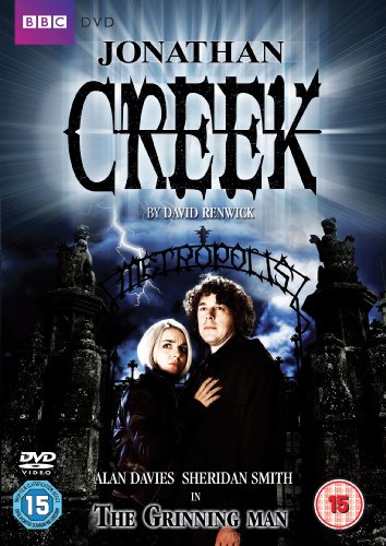 DVD cover for "Jonathan Creek: The Grinning Man" with two actors in dark attire.