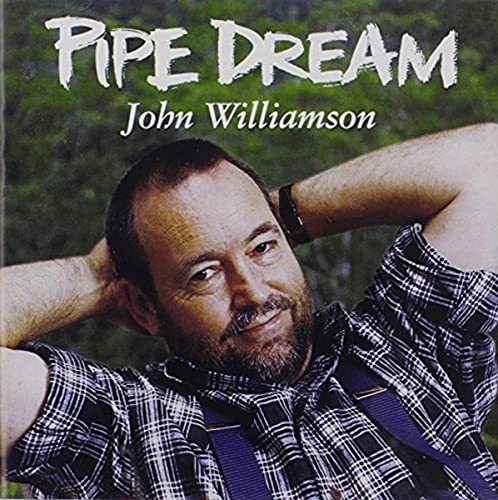 CD cover for John Williamson’s “Pipe Dream” featuring a portrait of the artist.