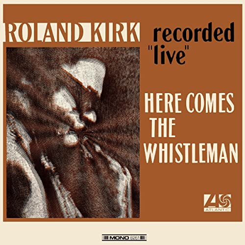 Roland Kirk album cover, "Here Comes The Whistleman," featuring a portrait.