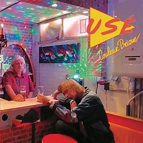 USE - Couleur Brique vinyl album cover with people in a bar scene.