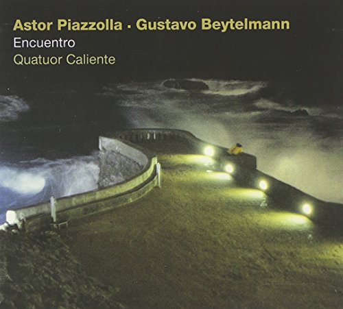 "CD cover with a dimly lit, curved walkway and cloudy night sky."