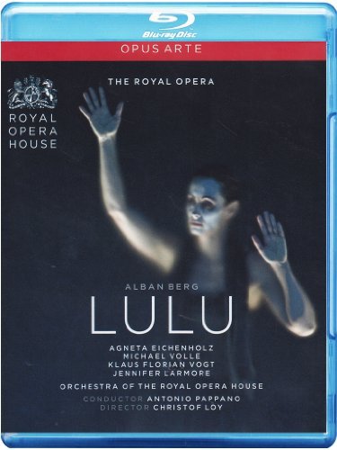 "Blu-ray cover featuring a woman with raised arms against a dark background."