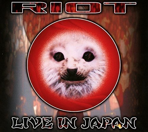 "Album cover with a polar bear face on a red circle, 'Riot' and 'Live in Japan' text."