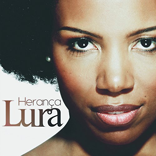 Close-up portrait of a Black woman, album cover for Lura’s “Herança.”