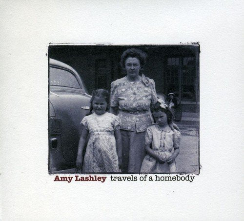 "Album cover with black-and-white photo of a woman and two children."