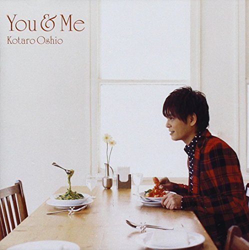 CD cover: Man at a table with pasta, window in background.