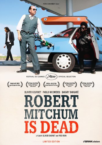 DVD cover for “Robert Mitchum Is Dead” featuring men at a gas station.