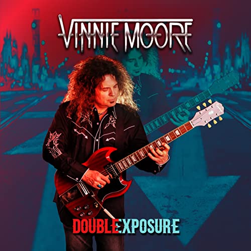Vinnie Moore album cover featuring guitarist with a red electric guitar.