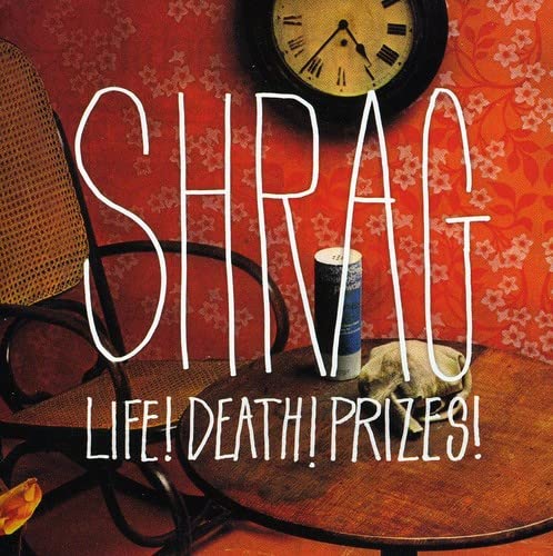 CD cover for Shrag’s “Life! Death! Prizes!” with a cat and clock.