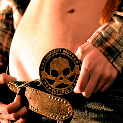 CD cover with skull and crossbones design held by hands.