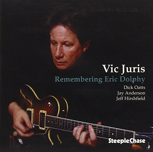 Album cover featuring a man playing guitar with text "Vic Juris, Remembering Eric Dolphy".