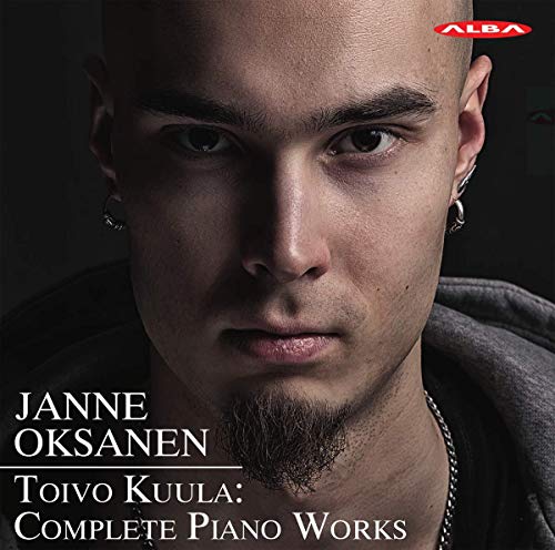 CD cover featuring a close-up of a man's face with text and a red logo.