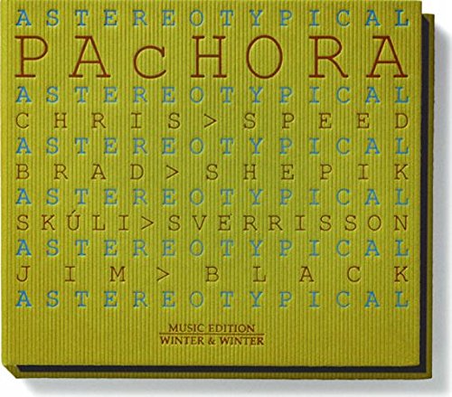 Yellow CD case with red and blue text on a striped background.