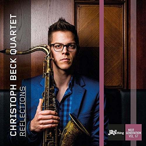 Man holding a saxophone, wearing a blue suit, on a CD cover.