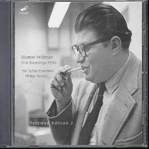 Black and white image of man in suit smoking a pipe, album cover.
