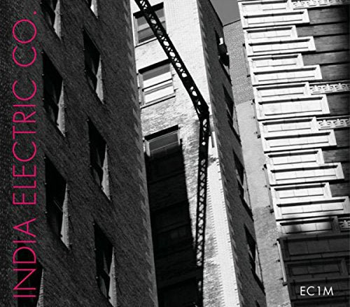 Album cover with black and white cityscape and pink text "India Electric Co." on left.