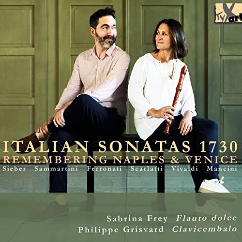 CD cover featuring two musicians, a man and a woman, with instruments.