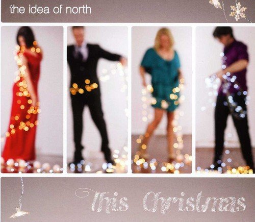CD cover featuring four blurred figures adorned with Christmas lights.