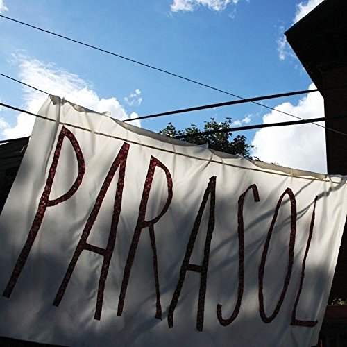 Vinyl record cover with large, red handwritten text reading "PARASOL".