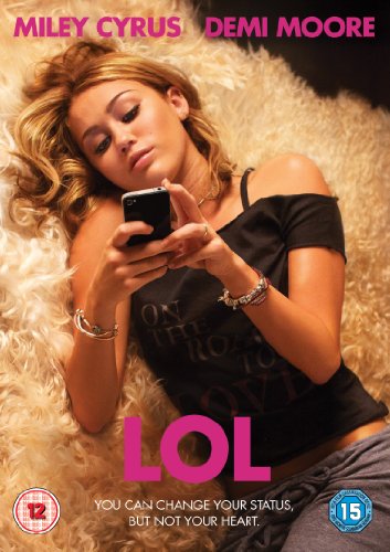 DVD cover featuring Miley Cyrus lying on a fluffy surface, holding a phone.
