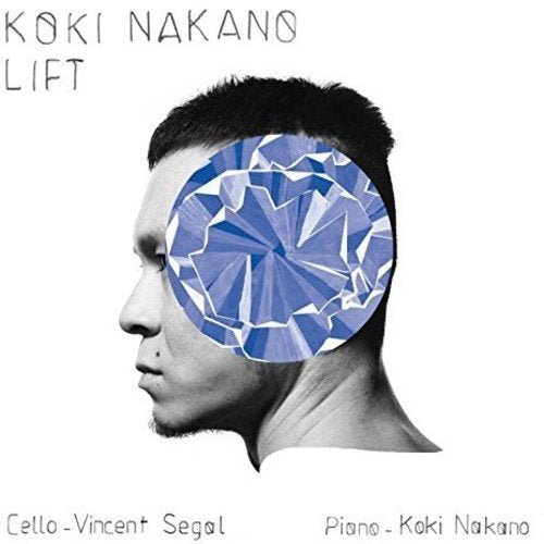Album cover with man's face and abstract blue circle over his eye.