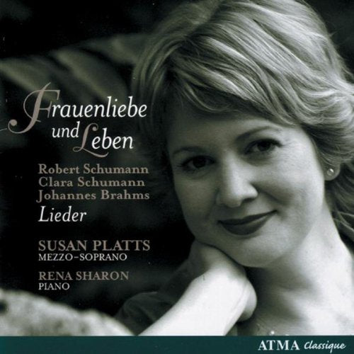 Black and white CD cover featuring a smiling woman with short hair.
