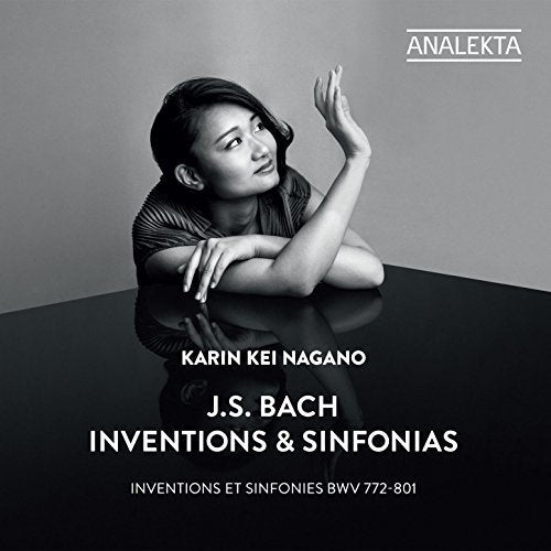 Black and white CD cover featuring a woman resting on a reflective surface.